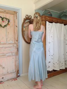 this slip dress has a beautiful color and would be amazing underneath a tulle lace dress or skirt...or another transparent garment like a tulle camisole, or blouse. or just wear it as a night gown bust  94 cm  37" (high ) waist  84 cm  33"   (model has waist  78 cm ) length from top of the shoulder to the bottom:  152 cm  60" I saw a bit discoloration in strong condition Sheer Silk Slip Dress For Night, Sheer Silk Slip Dress For Wedding, Summer Silk Dress With Bias Cut For Wedding Night, Spring Bias-cut Slip Dress For Wedding Night, Spring Bias Cut Slip Dress For Wedding Night, Elegant Blue Camisole Dress, Blue Bias Cut Slip Dress For Wedding, Spring Wedding Night Slip Dress With Bias Cut, Sheer Night Slip Dress For Spring