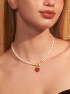 Editor's NotesENGBROX's jewelry is gorgeous and perfect for everyday wear.- Light-weighted- Eye-catching heart pendant detail- Pearl chain band- T-bar closure- Minimal and feminine stylesMeasurements(in.)- Size: 16.14in. (L)- Pearl: 0.28in. (W)- Pendant: 0.05in. (W) / 0.05in. (L)- Weight: 0.69oz.Composition & Care- Brass  Epoxy  Freshwater Pearl- Avoid direct heat and moisture- Professional cleaning is recommendedDesigner- by ENGBROX Dainty Heart Necklace With Pearl Chain, Vintage Everyday Jewelry For Valentine's Day, Everyday Vintage Jewelry For Valentine's Day, Trendy Pearl Chain Jewelry For Valentine's Day, Trendy Jewelry With Heart Pendant And Toggle Clasp, Trendy Heart Pendant Jewelry With Toggle Clasp, Elegant Heart Necklace With Toggle Clasp As Gift, Elegant Heart Necklace With Toggle Clasp, Heart Necklace With Pearl Chain For Gift