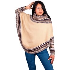 Turtleneck poncho for women, made with alpaca wool. An alpaca and wool yarn are intertwined to create a roomy and elegant poncho. This garment stands out for its incomparable softness and ethnic detail. The weaving of these natural fibers guarantees protection and warmth during use, and completes the garment with a refined texture. Nothing like an alpaca poncho to enjoy the winter. It is the perfect garment to wear with jeans, trousers or casual and dressy outfits. Ask for your alpaca poncho! They are of exceptional quality. This poncho will be ideal for birthday gift, anniversary gift. Surprise the ones you love the most with this alpaca wool gift. Measures: It is one size and measures: 28" long x 36" wide. The measurements are approximate, it could have a slight difference with the photo Oversized Alpaca Poncho For Winter, Cozy Alpaca Poncho For Fall, Cozy Alpaca Poncho For Winter, One Size Alpaca Poncho For Fall, Beige Alpaca Shawl For Fall, Fall Beige Alpaca Shawl, Winter Alpaca Poncho Cape, Winter Alpaca Cape Poncho, Cozy Long Sleeve Alpaca Poncho