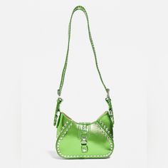 Western Vibes With This Bold Crossbody Bag Complete With Silver Tone Hardware Details Throughout. Features One Adjustable Crossbody Strap With Stitching Edge Detail, A Small Flap With Fastening To Front And A Structured Main Compartment. Complete With Chunky Eyelets And Stud Accents. -100% Polyurethane -Spot Clean -Color:Green -New Without Tags - It Has A Small Scratch On The Lower Right Side Of The Back Of The Bag Trendy Shoulder Bag With Snap Closure For Errands, Casual Green Shoulder Bag For Evening, Casual Green Evening Shoulder Bag, Green Shoulder Bag With Metal Hardware, Trendy Green Shoulder Bag With Metal Hardware, Urban Outfitters Rectangular Shoulder Bag For Summer, Green Bags With Metal Hardware For Shopping, Green Shopping Bag With Metal Hardware, Green Shopping Bags With Metal Hardware