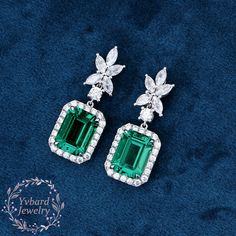 "❤Jewelry Details -Gold Type : Solid 10K Gold / Solid 14K Gold / Solid 18K Gold / Platinum (Choose One in Material Option) -Center Stone: Lab Created Emerald 7*9mm, Approximately 3.0ct*2pcs Color: Green--- 5A Clarity: VVS Cut: Emerald Cut / 3EX -Side Stone: Moissanite Moissanite Total Carat Weight: approx. 1.22ctw (a pair) Cut: Marquise Cut, Round Cut Color: D-F Clarity: VVS1 Earring Length: 25*9.5mm SKU: YE0047 ~*-*~Purchase Guarantee: - All our jewelry is handmade, and each process is refined. - 14 Day Refund Guarantee. - All our products are Free Shipping. - Free Gift Box&Packing. ~*-*~Please contact us if you need service: 1. Ring Resizing. 2. Metal Change(PT950/10k/14k/18k White/Yellow/Rose Gold). 3. Engraving ring (less than 10 letter). 4. Accept customization. We believe that our qu Luxury Green Diamond Earrings For Wedding, Classic Bridal Earrings With 17 Jewels For Anniversary, Formal Emerald Earrings With Prong Setting, Luxury Emerald Diamond Earrings For Wedding, Formal Baguette-cut Emerald Earrings, Formal Baguette Cut Emerald Earrings, Elegant Emerald Diamond Earrings For Anniversary, Emerald Earrings With Brilliant Cut For Anniversary, Emerald Earrings With Brilliant Cut For Wedding