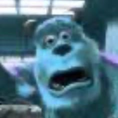 a blurry image of a blue dog with its mouth open