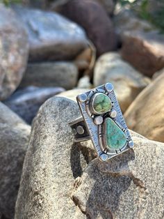 Artisan Handmade Natural Carico Lake Turquoise and Sterling Silver Artisian Designed Shield Style Ring USA Boho Southwestern Jewelry. This Statement Artisian handmade Shield Style ring is truly unique and one of a kind! Contemporary and Abstract in style meets artistic design with two gorgeous Natural Carico Lake Turquoise stones bringing it to life. The pale soft green hues in these stones are incredible. Natural Carico Lake Turquoise is becoming increasingly rare, making this piece a true trea Wild Jewelry, Silversmithing Jewelry, Bezel Jewelry, Metalsmithing Jewelry, Bold Jewelry, Green Hues, Southwestern Jewelry, Turquoise Stones, Jewelry Inspo