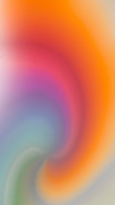 a blurry image of an orange, pink and blue swirl on a white background