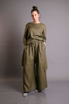 "Linen Pants, Women Pants, Linen Harem Pants Military  100% linen pants of high quality linen. The pants are very comfortable. They have four pockets, Elastic wais.  They have a sporty elegant style.  Loose fitting. The pants are available in a wide variety of colors. Model is wearing size S Heigth: 176 cm- 5\"9 inches Color: Dark Green Fabric: Linen 100% ►Quality NATURAL linen fabric. medium weight (200 g) linen fabric Express shipping 2-7 days with DHL. You can buy your DHL link here. https://www.etsy.com/listing/713478996/dhl-express-delivery-please-dont-forget?click_key=9e522509ed6b588cfa22bf7f44c0acb01f2a2025%3A713478996&click_sum=e283a020&ga_search_query=dhl&ref=shop_items_search_1  Custom Orders We could customize the garments. We can adjust the length of the skirt and pants, or the Green Wide Leg Pants With Pockets, Solid Color Wide Leg Pant Set For Work, Wide Leg Pant Set For Workwear, Khaki Wide-leg Harem Pants With Pockets, Khaki Linen Pants With Elastic Waistband, Loosely Fitted High-waisted Khaki Harem Pants, Khaki Ankle-length Harem Pants For Work, Khaki Straight Cargo Pants, Khaki Sets With Pockets For Spring