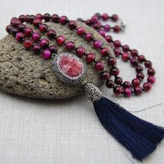 Pink Tigereye gemstone beads, Multy sapphire gemstone, Swarovski crystal, Silk tassel, Silver clasp Necklace circumference Length 32 inch. ( 32 cm ) ---------- Shipping-------------- Fast shipping via UPS 2-3 days For US and All of the world extra no charge Sending me requests and suggestions, please feel free to convo The product will be sent in a box with a gift bag For other inquiries, please visit the shop policies Thank you for visiting our shop http://www.etsy.com/shop/SevimsDesign Adjustable Tassel Necklace With Natural Stones For Gift, Tassel Jewelry With Round Beads For Gifts, Gift Jewelry With Tassels And Round Beads, Tulip Necklace, Swarovski Crystal Rings, Tiger Eye Gemstone, Tiger Eye Jewelry, Druzy Jewelry, Baroque Pearl Necklace