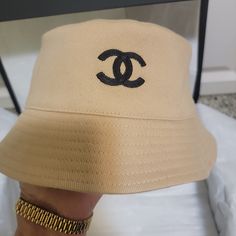 Cotton Chanel Reversible Bucket Hat With Interlocking Cc Embroidered On One Side And Multicolored Print On Other Side From Coco Chanel Collection Most Not Reversible This One Is So Cost Much More So Sad As Bought Meduim To Big On Me So Selling It .Never Worn Just Tryed On Comes With Tags Atached Chanel Recipt Chanel Wrapping Paper Camelia Flower Chanel Ribbon &Chanel Shopping Bag No Box As Box On Pict Belongs To My Chanel Maxi Flap Bag Luxury Beige Hat With Embroidered Logo, Designer Bucket Hat For Spring, Designer Beige Summer Hat, Designer Beige Adjustable Hat, Designer Adjustable Beige Hat, Designer Beige Hat For Summer, Designer Spring Bucket Hat With Short Brim, Designer Bucket Hat For Beach, Designer Bucket Hat For The Beach