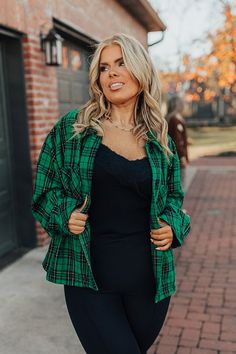 - This sweet layering piece is perfect for plaid season! - Unlined material with a black and metallic gold plaid pattern - A collared neckline - A button-up front - Long, loose sleeves with button closure cuffs - Functional chest pockets - A relaxed silhouette that ends in a straight hemline Measurements 1XL : Bust 54", Hip 54", Length 24.5", Sleeve Length 24", Waist 54". 2XL : Bust 56", Hip 56", Length 25.5", Sleeve Length 24.5", Waist 56". 3XL : Bust 58", Hip 58", Length 26", Sleeve Length 25" Dark Green Long Sleeve Outerwear For Fall, Green Long Sleeve Flannel Shirt For Work, Green Long Sleeve Flannel Shirt With Button Closure, Green Collared Flannel Shirt For Fall, Green Flannel Shirt With Button Closure For Fall, Green Long Sleeve Winter Flannel Shirt, Green Long Sleeve Flannel Shirt For Winter, Green Flannel Shirt For Workwear And Fall, Green Winter Button-up Flannel Shirt