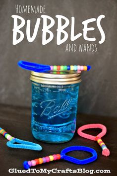 homemade bubbles and wands in a mason jar