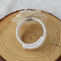 "Applications: wedding, engagement, daily wear,party Material: Pearl, shell,shell beads beads size :4-6-8mm,15*15mm ,20*30mm Bracelet Size:6.5-7.5\" Color: As show We can adjust the length of your requirements All the product are designed and made by myself so if you want any adjustments in length or style, don't forget to contact me. Otherwise, I will send you the one in the picture. Welcome wholesale and customization. We can customize according to your requirements. Payment We accept PayPal o Elegant Mother Of Pearl Beaded Bracelets As Gift, Adjustable Mother Of Pearl Bracelets For Weddings, Adjustable Mother Of Pearl Wedding Bracelets, White Shell Jewelry Gift, Mother Of Pearl Beaded Bracelet As A Gift, White Mother Of Pearl Bracelets For Wedding, Pearl White Shell Jewelry Gift, Shell Beaded Bracelets As Gift, Elegant Adjustable Shell Bracelet