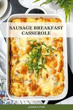 sausage breakfast casserole in a white dish with green garnish