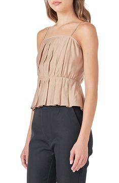 Elevate your warm-weather style with this light and airy peplum top fashioned with impeccable pleats. Square neck Adjustable straps Lined 75% rayon, 25% polyester Hand wash, dry flat Imported Spring Pleated Tops, Sleeveless Pleated Tops For Spring, Fitted Pleated Summer Tops, Chic Pleated Waist Spring Tops, Chic Peplum Top For Day Out, Fitted Pleated Top For Day Out, Chic Summer Tops With Pleated Waist, Chic Peplum Tops For Summer, Spring Ruffle Hem Cami Top