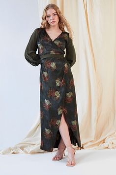 Our Verdant long-sleeve wrap dress is one of our must-have designs for any season. This wrap maxi dress's rich, earthy tones and blouson sleeves feel so reminiscent of the '70s.  Sarvin wrap-around dress features a deep V-neck shape and is made from lustrous eco-friendly jacquard fabric. The wrap silhouette shape is flattering as it accentuates the waist and gives you that chic bohemian style.  Made from a silky Jacquard eco-friendly fabric  Long Sleeve Wrap Dress  Concealed hook and button insi Evening Midi Dress With Blouson Sleeves For Fall, Fall Evening Midi Dress With Blouson Sleeves, Fall Maxi Dress With Surplice Neckline For Date Night, Fitted Maxi Dress With Surplice Neckline For Fall, Long Sleeve Faux Wrap Dress For Date Night, Fall Dress With Faux Wrap And Surplice Neckline, Chic Fall Maxi Wrap Dress, Fall Dresses With Faux Wrap And Surplice Neckline, Faux Wrap Long Sleeve Dress For Fall