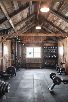 a home gym with lots of exercise equipment