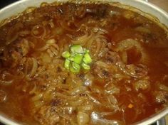 a large pot filled with food on top of a stove