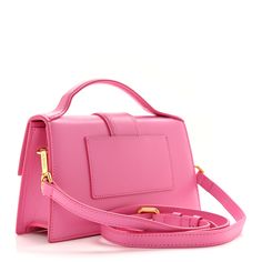 This is an authentic JACQUEMUS Smooth Calfskin Le Grand in Pink. This super-chic shoulder bag is crafted of smooth leather in pink. The bag features a top handle strap and gold hardware. This front flap opens to a beige fabric interior with a leather pocket. Leather Pocket, Beige Fabric, Smooth Leather, Gold Hardware, Top Handle, Calf Skin, Shoulder Bag, Leather, Fabric