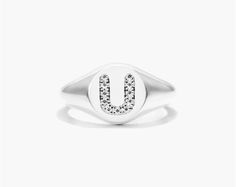 14K White Gold Diamond U Initial Signet Ring. This timeless ring will dazzle all who see it. Perfect for any age and occasion, this ring makes the perfect individualized gift! Timeless White Gold Initial Ring With Round Band, White Diamond Round Signet Ring, Classic White Gold Initial Diamond Ring, Luxury White Gold Initial Ring With Round Band, Classic White Gold Diamond Initial Ring, White Timeless Signet Ring With Brilliant Cut, White Gold Sterling Silver Round Cut Signet Ring, Elegant White Gold Initial Ring, Elegant White Gold Rings With Initials