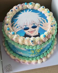 a birthday cake decorated with an anime character