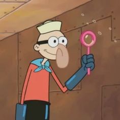 a cartoon character holding a magnifying glass in his hand