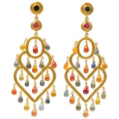 These chandelier earrings are composed of 2 round tourmalines (one pink and one green) at the part of the earring and of 20 briolette drops of natural multicolour sapphires (around 12carats). The colours of the sapphires are yellow, orange, red, pink, blue, green. They are handmade in 22 karat gold. Handmade Chandelier, Diamond Chandelier Earrings, Gold Chandelier Earrings, Contemporary Earrings, Tourmaline Earrings, Gold Chandelier, Antique Earrings, Rose Gold Jewelry, Yellow Gold Earring