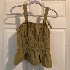 Brownish Olive Green Sleeveless Blouse. Nwot, Never Worn. Khaki Cotton Vest Top, Khaki Sleeveless Cotton Tank Top, Sleeveless Khaki Cotton Tank Top, Khaki Cotton Sleeveless Tank Top, Khaki Cotton Tank Top, Khaki Cotton Tops For Vacation, Khaki Fitted Sleeveless Crop Top, Fitted Sleeveless Khaki Crop Top, Cotton Vest Crop Top For Day Out