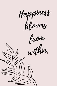 the words happiness blooms from within are drawn in black ink on a light pink background