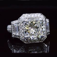 an old cut diamond ring with baguets