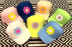 Spring has sprung at the HappyStack Shop! Bring a smile to everyone you pass by in our new HappyDaisy™️ Trucker hats. Breathable and comfortable--one size fits most. Playful White Trucker Hat For Spring, Playful Mini Cap Hats For Spring, Adjustable Smiley Face Hat For Spring, Playful Spring Mini Cap Hat, Playful Spring Trucker Hat With Curved Brim, Novelty Spring Cap Hat, Novelty Spring Cap, Spring Smiley Face Cap, Playful Spring Cap