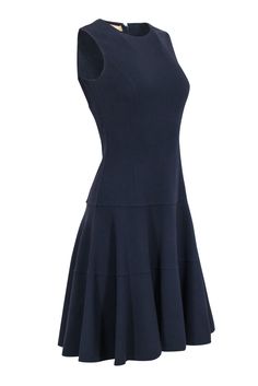 This modern navy dress by Michael Kors is striking in its simplicity! Make it a foundational piece in your wardrobe across seasons. The A-line silhouette is emphasized by a drop-waist, a style that will take you from desk to dinner. Size 4 96% Wool, 4% Spandex Made in Italy Drop Waist Sleeveless Concealed back zipper Bust 32" Waist 26" Shoulder to hem 38.5" Flattering A-line Sleeveless Dress For Work, Navy Sleeveless Fitted Dress, Navy Sleeveless Dress For Work, Navy Fitted Sleeveless Dress, Chic Michael Kors Dress For Work, Michael Kors Fitted Dress For Formal Occasions, Classic Navy A-line Dress, Chic Michael Kors Workwear Dresses, Michael Kors Fitted Formal Dress