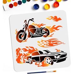 a car and motorcycle with flames on it next to watercolor paints