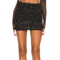 Brand New, Never Worn, Black Mini Sequin Skirt, Tag Says Size 10 But Fits Like Size 6, Has Stretch, Zip Back Closure, Extra Sequins. Maybe Missing Sequins(See Last 2 Photos Same Spot, Up Close/At Distance). Not Noticeable. Full Lined. Length 15” Waist 14.5” Stretches To 17” Hem 18” Glamorous Short Mini Skirt For Night Out, Fitted High Waist Evening Mini Skirt, Fitted Mini Skirt For Cocktail Parties, Fitted High Waist Mini Skirt For Evening, Fitted Skort For Spring Evening, Black Sequined Mini Skirt For Cocktail, Black Sequined Mini Skirt For Cocktail Events, Black Sequined Mini Skirt For Spring, Black Sequined Bottoms For Party