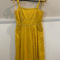 Golden Yellow Dress Nwt Yellow A-line Sundress For Day Out, Yellow Casual Knee-length Sundress, Yellow Knee-length Casual Sundress, Casual Yellow Knee-length Sundress, Casual Yellow A-line Midi Dress, Chic Yellow Cotton Sundress, Yellow Spring Sundress, Mustard Sleeveless Dress For Brunch, Yellow Knee-length Sundress