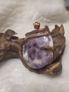 Natural Amethyst Stone Pendant ♥ Increases nobility ♥ Spiritual awareness ♥ Psychic abilities ♥ Inner peace and healing ♥ Healing of body, mind & soul ♥ Positive transformation ♥ Meditation ♥ Balance ♥ Relieves stress ♥ CommunicationDetails: Handcrafted Item using Copper with Cold Forge Wire Wrap technique. This pendant measures 2 1/2 inch on Length incuding Bail, and 1 1/2 inches wide at top. Material: Natural Amethyst, Copper One Of A Kind - Ships within 1-3 Days Securely Packaged. Your Choice Handmade Round Crystals For Meditation, Amethyst Crystal Healing Necklace With Round Pendant, Spiritual Crystal Necklace With Large Stone, Spiritual Amethyst Crystal For Gift, Spiritual Healing Crystal Pendant, Healing Spiritual Crystal Pendant, Lavender Spiritual Crystals For Gift, Spiritual Lavender Crystals For Gifts, Spiritual Amethyst Pendant Gemstone