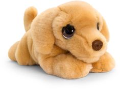 a brown stuffed dog laying on top of a white floor