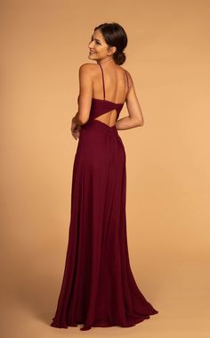 the back of a woman wearing a burgundy dress