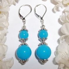 Turquoise Blue Statement Earring Handmade Beaded Silver Set Dangle Drop 4693 This Cute Beaded Costume Jewelry Earring Set Is Brand New And Handmade By Me - Wvluckygirl. Handcrafted With Turquoise Blue Acrylic Beads. The Pair Also Have Silver Toned Costume Jewelry Beads That Were Antiqued In Black. They Dangle & Drop From 925 Sterling Silver Lever Backs For Women's Pierced Ears. Measure 2 Inches Tall & 1/2 Inch Wide. Each Single Earring Weighs 2.5 Grams. Perfect Fashion Accessory For When You Nee Light Blue Jewelry With Dangling Round Beads, Nickel-free Light Blue Round Bead Jewelry, Elegant Turquoise Earrings With Dangling Beads, Elegant Turquoise Beaded Earrings For Gift, Elegant Turquoise Beaded Dangling Earrings, Elegant Light Blue Beaded Dangle Earrings, Elegant Blue Jewelry With Silver Beads, Elegant Light Blue Beaded Drop Earrings, Turquoise Silver Beads Drop Earrings