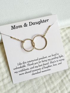 Mom and Daughter Bond Necklace Mother's Day Gift Linked Circle Necklace Interlocking Circle Necklace Gift to Mom from Daughter Gold filled Double Circle Necklace Gift to mom with message * The necklace comes with a jewelry card featuring a default message, just like the ones shown in the photos. It will be packaged in a craft box, ready for gifting.  DETAILS: - 14K gold filled  - Length should be added at check out - The circle has sparkle finish Mother's Day Anniversary Gift Necklace With Message Card, Mother's Day Anniversary Necklace With Message Card, Mother's Day Jewelry With Message Card For Anniversary Gift, Mother's Day Adjustable Chain Jewelry For Anniversary Gift, Mother's Day Jewelry With Adjustable Chain For Anniversary, Mother's Day Anniversary Gift Jewelry With Message Card, Mother's Day Jewelry Gift With Adjustable Chain, Adjustable Chain Jewelry For Mother's Day Anniversary Gift, Mother's Day Birthday Necklace With Message Card