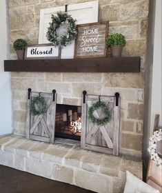 a fireplace decorated with wreaths and other decorations