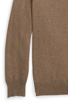 Organic cotton blended with 5% cashmere lends luxury to a classic silhouette on zip-neck sweater - a perfect fall and winter layering piece. 95% Cotton 5% Cashmere Quarter Zip Mock Contrast Interior Collar Leather Zipper Pull Professionally Clean Casual Cashmere V-neck Sweater For Layering, Classic Long Sleeve Turtleneck For Fall, Classic Long Sleeve Fall Turtleneck, Classic Cashmere V-neck Sweater With Long Sleeves, Classic Brown Cashmere Top, Classic Winter Cashmere Polo Sweater, Classic Cashmere Polo Sweater For Winter, Classic Cashmere Polo Sweater, Fall Layering Merino Wool Polo Sweater