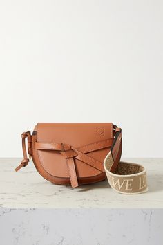 Loewe's 'Gate' bag is named after the gold-tone latch at the side. It's been crafted in Spain from supple leather, lined in suede and detailed with contrasting topstitching that's testament to the brand's artisanal expertise. Wear the logo-jacquard canvas strap cross-body. Accessory Inspo, Beige Handbags, Loewe Bag, Handbags Women, Chic Clothing, Mini Canvas, Designer Bags, Bag Straps, Net A Porter