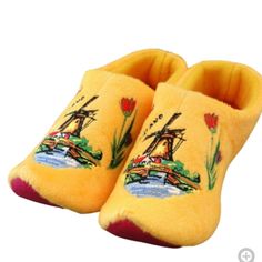 Women's Size: 8- 9.5 Lovely Warm Clog Slippers For Indoors. Equipped With An Anti-Slip Layer On The Bottom. These Slippers Are Yellow In Color With A Traditional Windmill And Tulips Embroidered On The Toe. Cool Warm Clog Slippers And Also A Nice Gift. Spring Indoor Slip-on Slippers, Indoor Slip-on Slippers For Spring, Closed Toe Indoor Slippers For Spring, Yellow Slip-on Winter Slippers, Yellow Casual Flat Slippers, Casual Yellow Slippers For Spring, Casual Yellow Flat Slippers, Yellow Casual Slip-on Slippers, Yellow Slip-on Casual Slippers