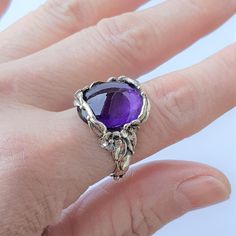 This is one of a kind sterling silver ring with Amethyst gemstone. Gemstone: Amethyst Metal: sterling silver 925 Size of the ring: 7 3/4 US > Shipping: - all rings are shipped in a gift box - shipped within 2 days - insurance is included - tracking number is provided > About us: All our jewelry designed and created by Geni. From casting to finishing touches, all production is done in house. We hope our jewelry will uplift your spirit and brighten your day! Click here to see more jewelry in our store: http://www.etsy.com/shop/GeniSilver January - garnet  February - amethyst  March - aquamarine  April - diamond  May - emerald  June - alexandrite July - ruby August - peridot  September - sapphire  October - pink tourmaline November - topaz, citrine  December - blue topaz, turquoise ❤️ xoxo If Sterling Silver Amethyst Ring With Accent Stones, Formal Spiritual Amethyst Ring, Formal Sterling Silver Amethyst Open Ring, Spiritual Sterling Silver Rings With Accent Stones, Fine Jewelry Amethyst Ring With Polished Finish As Gift, Silver Amethyst Ring With Round Accent Stones, Silver Amethyst Ring With Polished Finish, Silver Amethyst Birthstone Ring With Round Stone, Silver Polished Amethyst Ring