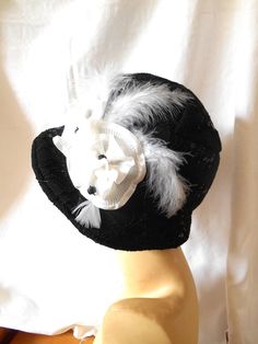 Beautiful 1920's 1930's  black Vintage style Downton Abbey Great Gatsby  inspired  Cloche Hat. Made in my own studio in Suffolk UK.   All of my cloche hats and berets are one off designs therefore individual to you the buyer. This hat is fully lined and measures 22.1/2"  (57.15cms) around the interior of the crown. Thus giving a small head fitting. I have made this lovely hat from a medium weight good quality black cotton blend fabric which I have covered with black lace and sequin fabric. To on Gatsby Hat, 1930's Style, Cloche Hats, Flapper Hat, Unique Hats, 1930s Fashion, Cloche Hat, Great Gatsby, Sequin Fabric