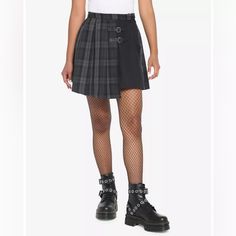 Nwt Hot Topic Black & Grey Plaid Buckle Asymmetrical Pleated Mini Skirt In Size Juniors Large. Symmetry Is Overrated. This Black & Grey Plaid Pleated Skirt Has An Asymmetrical Cut With Two Faux Leather Buckle Accents. Side Zipper Closure. Pair With Your Favorite Band Tee And Boots. Self: 95% Polyester; 5% Spandex Lining: 100% Polyester Wash Cold; Dry Low Approximate Measurements When Laid Flat: 15” At Waist 19” Long No Flaws. Bin 27 Plaid Pleated Mini Skirt, Asymmetrical Cut, Plaid Pleated Skirt, Grey Plaid, Yellow Plaid, Pleated Mini Skirt, Leather Buckle, Fitted Skirt, Polo Dress