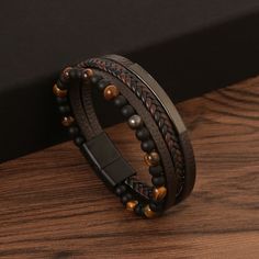 Material: Alloy Style: Original Design Black Bohemian Leather Bracelet, Casual Brown Metal Bracelets, Elegant Black Beaded Leather Bracelet, Casual Brown Metal Bracelet, Handmade Black Metal Braided Bracelets, Handmade Metal Braided Bracelets In Black, Handmade Black Leather Braided Bracelet, Adjustable Brown Metal Bracelet, Adjustable Brown Metal Bracelets