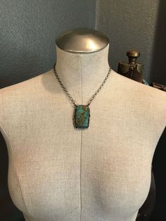 Sterling silver and turquoise. Sterling drop accents. Link chain. 20" total length. Pendant measures 2" long. Stamped sterling and signed by Navajo artist. The Raven, Link Chain, Turquoise Necklace, Turquoise, Sterling Silver, Chain, Pendant, Silver