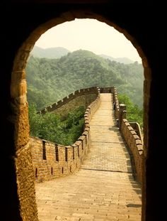 an archway leading to the great wall of china