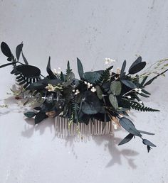 Eucalyptus, fern hair comb made from natural preserved eucalyptus,ferns, bloom broom,millet and dried flowers.

This Wedding Greenery Hair Comb is perfect for the bohemian-inspired bride looking to add a touch of nature to her bridal ensemble. Each Bridal Hair Comb features beautiful everlasting that will stay fresh-looking throughout your special day. Whether you're the bride or a bridesmaid, this Flower Hair Comb is a timeless accessory that complements any hairstyle effortlessly.
Boho hair comb will be a great addition to the image for a party, photo shoot and other events.

Hair comb is designed and manufactured to make your special days special.

With proper care, the bridal hair pin will last a long time from 3 to 5 years.

Please remember that the colour of the leaves can differ sli Wedding Hairpiece, Preserved Eucalyptus, Dried Flowers Wedding, Wedding Greenery, Bohemian Style Wedding, Hair Comb Bridal, Floral Hair Combs, Flower Comb, Boho Hair