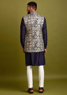 Editor's Note Navy Blue Open Bundi Jacket In Silk Base With Thread And Patra Embroidery. It Is Paired With A Matching Kurta And Pyjama Pants. Color: Navy Blue Fabric: Silk Care: Dry Clean Only About the Designer Inspired By The Minimalism, Utilitarianism And Functionality, Chatenya Mittal Is A Label Focused Entirely On Menswear. Chatenya Mittal Is Revisiting The Classic Silhouette Bringing New Energy And Working To Create Future Classics By Subtly Combining Fabric Blocking, Layering, Attention T Pyjama Pants, Kurta Pyjama, Open Jacket, Silk Kurta, Navy Blue Fabric, Pajama Pant, Silk Pajamas, New Energy, Kurta Set