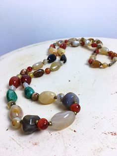 Luxury Agate Jewelry With Gemstone Beads, Luxury Brown Gemstone Beaded Necklace, Cheap Vintage Beaded Necklaces With Polished Beads, Luxury Multicolor Agate Jewelry, Luxury Vintage Agate Beads, Multicolor Agate Beaded Necklaces, Multicolor Agate Large Beaded Necklaces, Multicolor Agate Gemstone Bead Necklaces, Multicolor Large Beads Agate Necklace